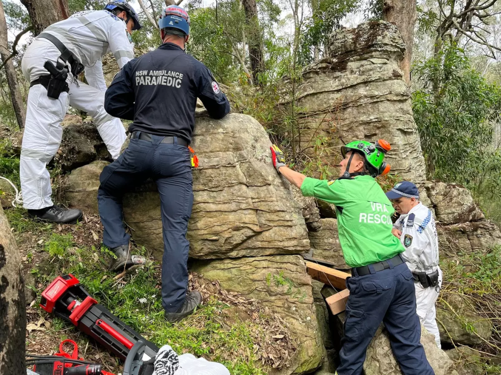 Woman Left Hanging Upside Down Between Two Rocks After Dropping Her iPhone